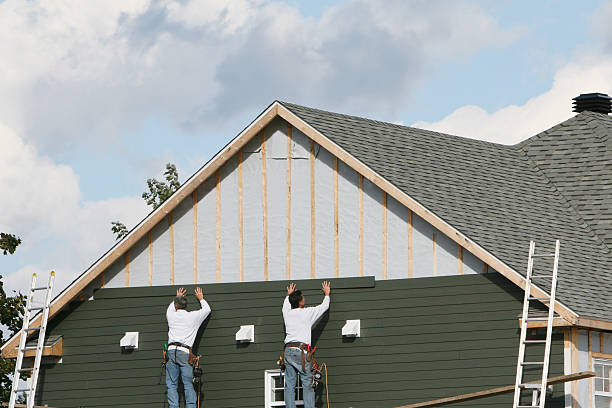 Professional Siding technician working in Ashland, OR